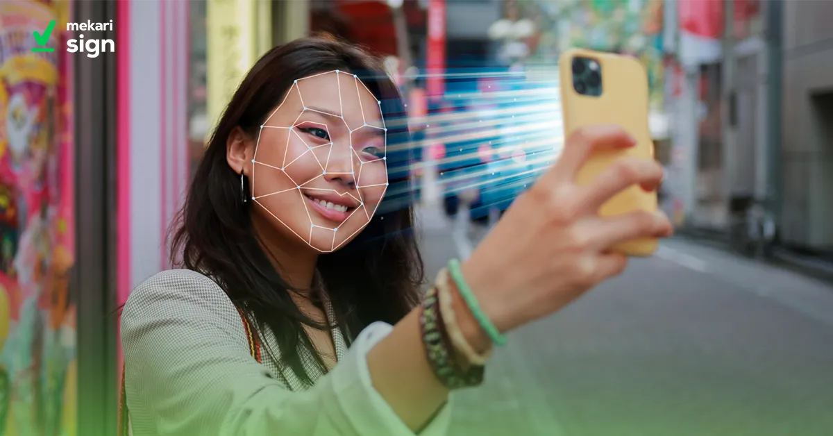Seorang wanita sedang melakukan selfie dengan ponsel, sambil wajahnya dipindai oleh teknologi face recognition yang menunjukkan garis dan titik-titik pada wajah sebagai bagian dari proses identifikasi biometrik.